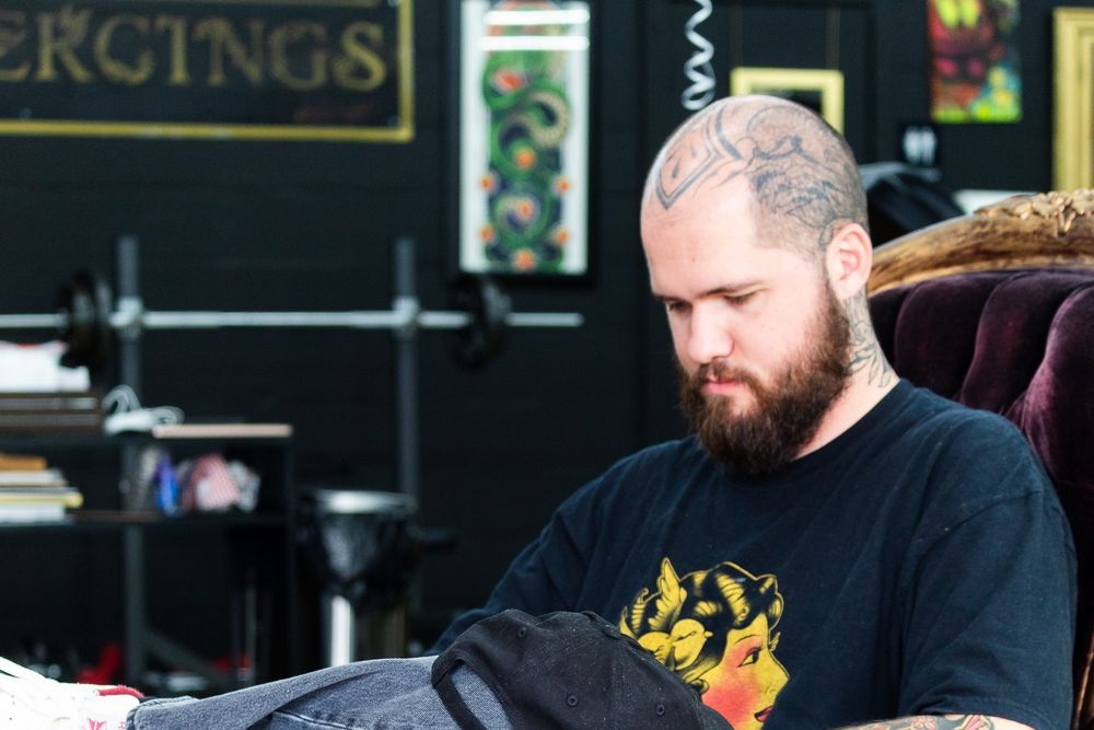 A Space Coast Ink artist in the shop